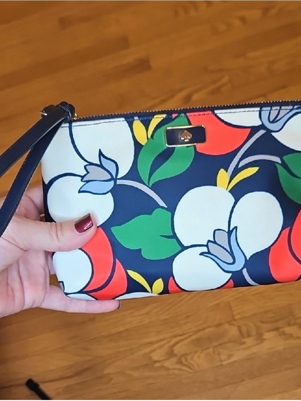 kate spade navy floral wristlet with multicolor blooms